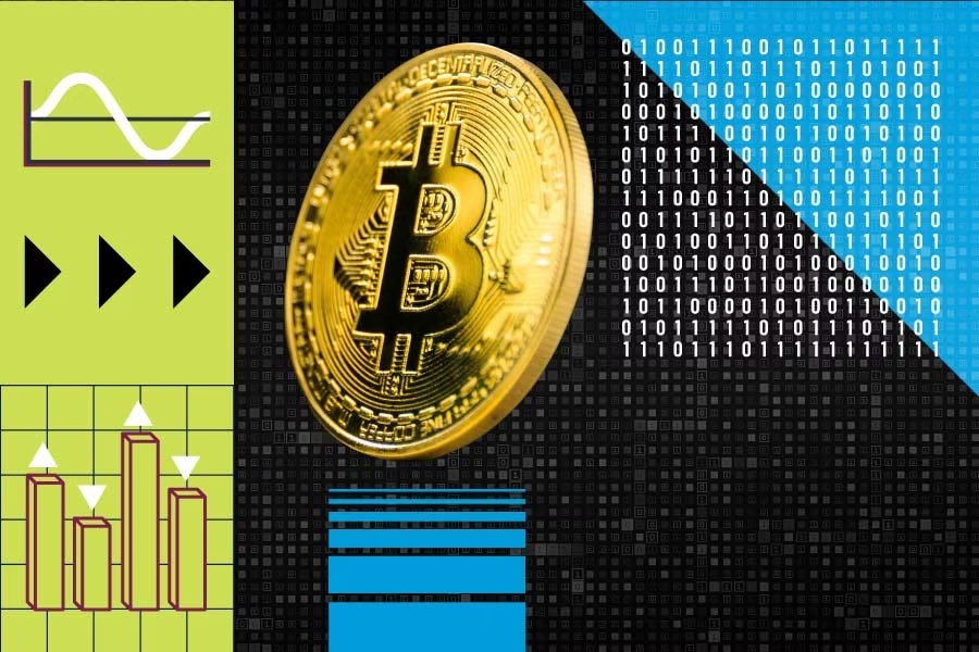 A bitcoin next to binary code and charts.