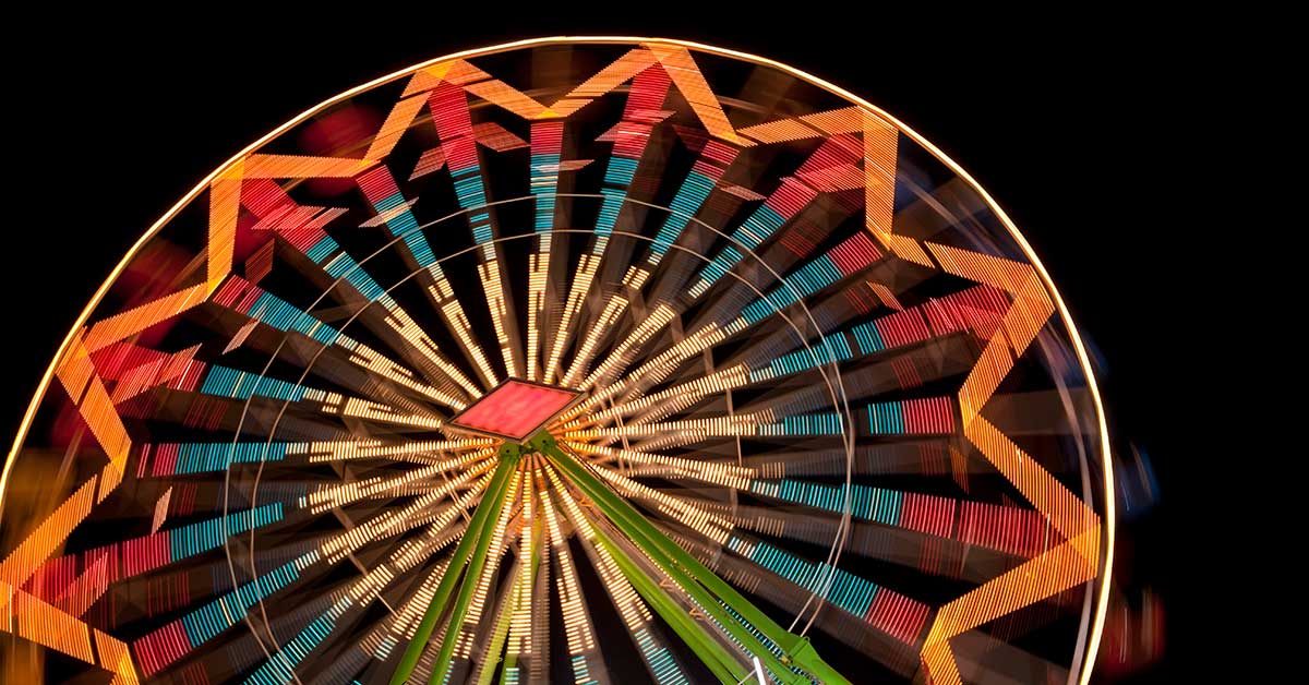 lit up ferris wheel at night