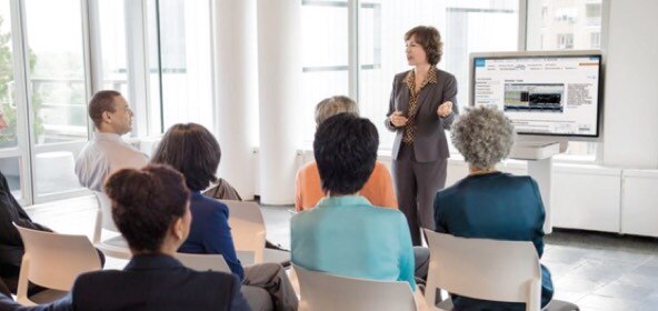 Woman teaching small group